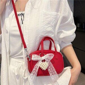 Heart-Adorned Leather Crossbody Bag